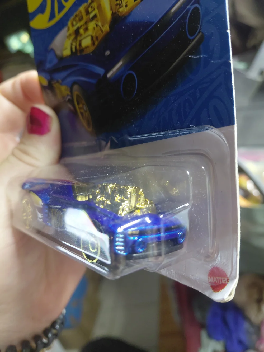 the Hot Wheels Rodger Dodger 2.0 from the 2026 58th Anniversary Blue and Gold se